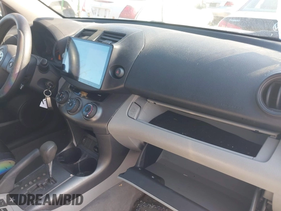 2009 Toyota RAV4 with VIN JTMBF33V29D010826, listed as a IAAI auction lot 41768946 with 160,415 mi miles. Bid and sale history available at carsss.com. Image 5.