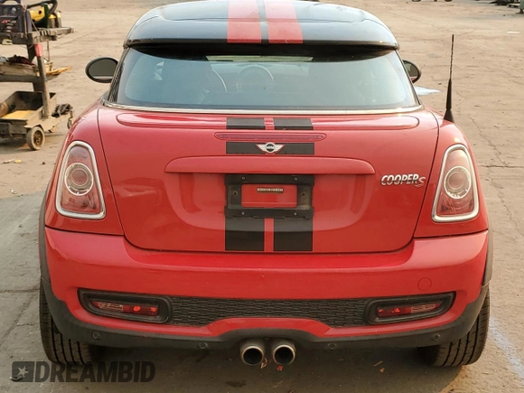 2012 MINI Coupe S z VIN WMWSX3C57CT155013, wystawiony jako Copart lot #88066275 z przebiegiem 69 870 mil mil oraz Szkody całkowita. Historia ofert i sprzedaży dostępna na DreamBid. Obrazek 6.