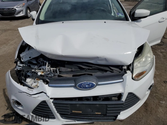 2012 Ford Focus SE with VIN 1FAHP3F25CL213172, listed as a Copart auction lot 51518755 with 67,520 mi miles and Salvage Title. Bid and sale history available at carsss.com. Image 11.