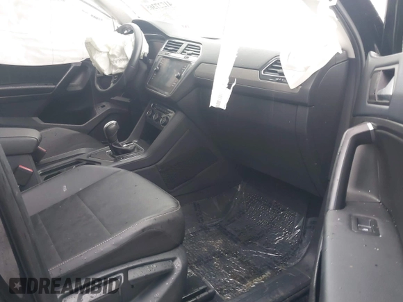 2021 Volkswagen Tiguan SE with VIN 3VV3B7AX3MM058751, listed as a IAAI auction lot 41527365 with 19,646 mi miles and . Bid and sale history available at DreamBid. Image 5.