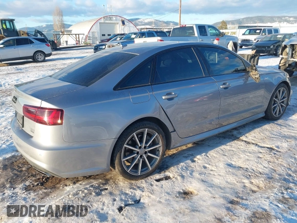 2018 Audi A6 Sport with VIN WAUF3AFC9JN078755, listed as a IAAI auction lot 41398722 with 51,677 mi miles. Bid and sale history available at carsss.com. Image 4.