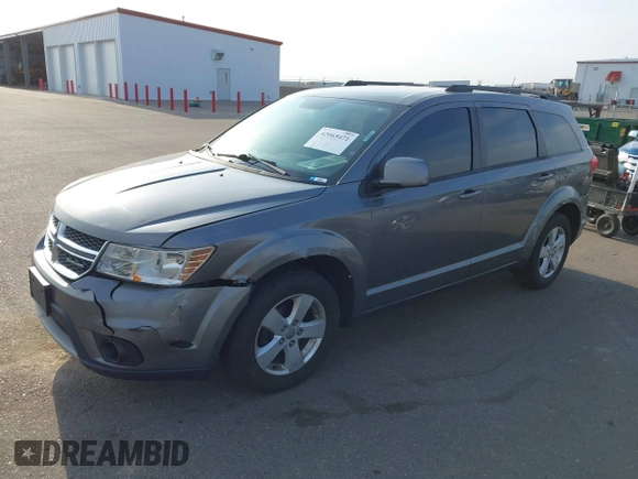 2012 Dodge Journey SXT z VIN 3C4PDCBG9CT208092, wystawiony jako IAAI lot #42065471 z przebiegiem 208 794 mil mil oraz . Historia ofert i sprzedaży dostępna na DreamBid. Obrazek 2.