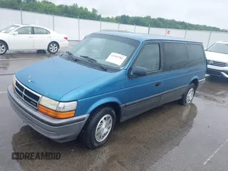 1992 Dodge Grand Caravan z VIN 1B4GH54R6NX218758, wystawiony jako IAAI lot #42362782 z przebiegiem 172 142 mil mil oraz . Historia ofert i sprzedaży dostępna na DreamBid. Obrazek 2.