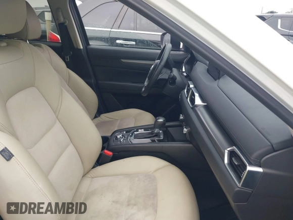 2017 Mazda CX-5 Touring z VIN JM3KFBCL5H0128584, wystawiony jako IAAI lot #42354669 z przebiegiem 56 563 mil mil oraz . Historia ofert i sprzedaży dostępna na DreamBid. Obrazek 5.
