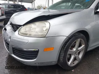 2009 Volkswagen Jetta S z VIN 3VWJZ71K29M148712, wystawiony jako IAAI lot #41724523 z przebiegiem 112 043 mil mil oraz . Historia ofert i sprzedaży dostępna na DreamBid. Obrazek 14.