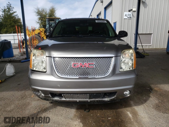2012 GMC Yukon Denali with VIN 1GKS1EEFXCR236823, listed as a Copart auction lot 49830405 with 134,568 mi miles and Salvage Title. Bid and sale history available at carsss.com. Image 5.