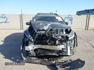 2014 Jeep Cherokee Latitude with VIN 1C4PJMCBXEW317384, listed as a IAAI auction lot 41621635 with 180,971 mi miles and . Bid and sale history available at DreamBid. Image 13.