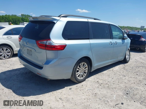 2016 Toyota Sienna XLE with VIN 5TDYK3DC9GS708693, listed as a IAAI auction lot 42231532 with 153,865 mi miles and . Bid and sale history available at DreamBid. Image 4.