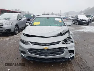 2018 Chevrolet Malibu LT z VIN 1G1ZD5STXJF269890, wystawiony jako IAAI lot #41504935 z przebiegiem 107 190 mil mil oraz . Historia ofert i sprzedaży dostępna na DreamBid. Obrazek 12.