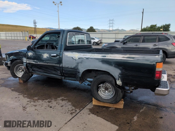1994 Toyota Pickup DX with VIN JT4RN81PXR5174113, listed as a Copart auction lot 64211905 with 209,694 mi miles and Salvage title. Bid and sale history available at DreamBid. Image 2.
