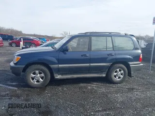 2002 Toyota Land Cruiser with VIN JTEHT05J122018974, listed as a IAAI auction lot 41543290 with 266,926 mi miles. Bid and sale history available at carsss.com. Image 14.