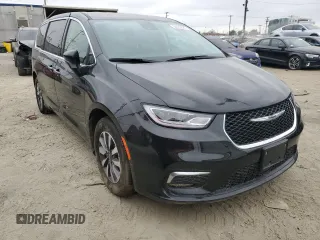 2023 Chrysler Pacifica Hybrid Touring L with VIN 2C4RC1L78PR541746, listed as a Copart auction lot 54633865 with 5,291 mi miles and Non repairable. Bid and sale history available at DreamBid. Image 4.