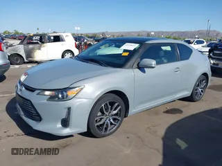 2015 Scion tC with VIN JTKJF5C7XFJ012872, listed as a IAAI auction lot 42128621 with 100,832 mi miles. Bid and sale history available at carsss.com. Image 18.