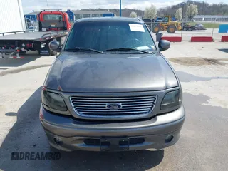 2002 Ford F-150 Harley Davidson with VIN 1FTRW07392KE11409, listed as a IAAI auction lot 41877998 with 148,476 mi miles. Bid and sale history available at carsss.com. Image 12.