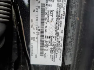 2013 Ford Focus SE z VIN 1FADP3F24DL216824, wystawiony jako Copart lot #52142715 z przebiegiem 149 611 mil mil oraz Szkoda całkowita • Salvage title. Historia ofert i sprzedaży dostępna na DreamBid. Obrazek 13.