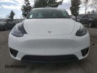 2023 Tesla Model Y Long Range z VIN 7SAYGDEE3PF916132, wystawiony jako Copart lot #51645625 z przebiegiem 28 238 mil mil oraz Szkoda całkowita • Salvage title. Historia ofert i sprzedaży dostępna na DreamBid. Obrazek 5.