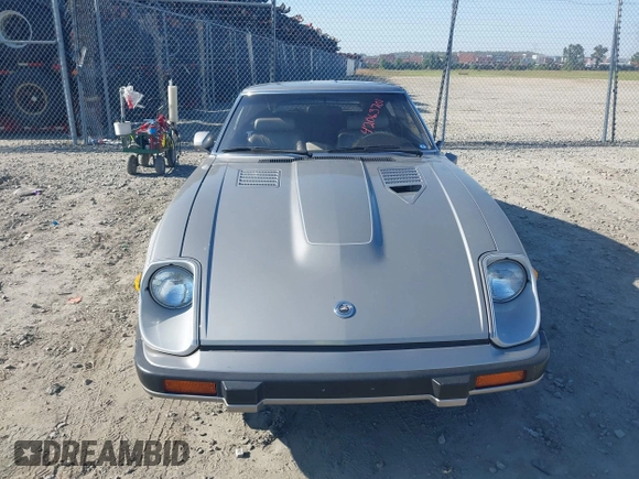 1983 Datsun 280ZX z VIN JN1HZ04S3DX562060, wystawiony jako IAAI lot #42063701 z przebiegiem 35 754 mil mil oraz . Historia ofert i sprzedaży dostępna na DreamBid. Obrazek 12.