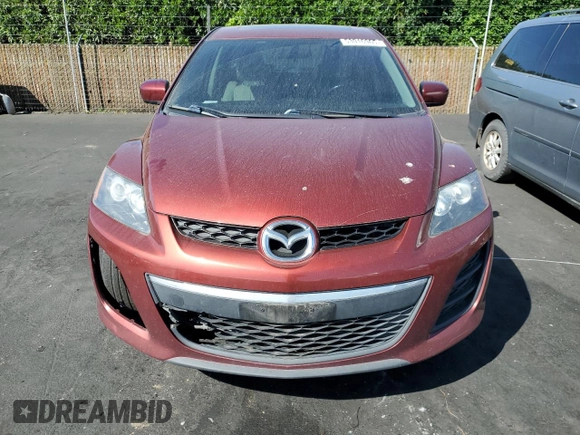 2010 Mazda CX-7 SV z VIN JM3ER2WM3A0321623, wystawiony jako Copart lot #53916965 z przebiegiem 216 749 mil mil oraz Czysty tytuł • Clean title. Historia ofert i sprzedaży dostępna na DreamBid. Obrazek 5.