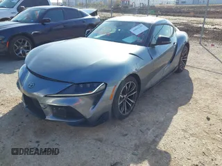 2021 Toyota GR Supra 2.0 with VIN WZ1DB2C01MW041227, listed as a IAAI auction lot 41011310 with 17,840 mi miles. Bid and sale history available at carsss.com. Image 2.