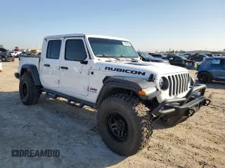 2022 Jeep Gladiator Rubicon with VIN 1C6JJTBG6NL142413, listed as a Copart auction lot 86098244 with 20,750 mi miles and Salvage title. Bid and sale history available at DreamBid. Image 4.