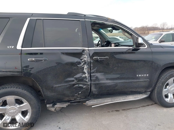 2016 Chevrolet Tahoe LTZ with VIN 1GNSKCKC9GR217166, listed as a IAAI auction lot 41152096 with 133,589 mi miles. Bid and sale history available at carsss.com. Image 6.