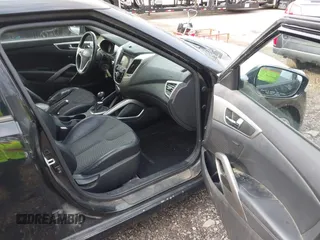 2012 Hyundai Veloster w/Black Int with VIN KMHTC6AD6CU020657, listed as a IAAI auction lot 42031670 with 187,585 mi miles and . Bid and sale history available at DreamBid. Image 5.