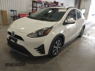 2018 Toyota Prius One with VIN JTDKDTB38J1599974, listed as a IAAI auction lot 41977533 with 71,225 mi miles and . Bid and sale history available at DreamBid. Image 2.