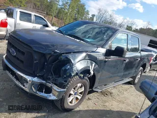 2015 Ford F-150 XLT with VIN 1FTEW1E84FFB18132, listed as a IAAI auction lot 41565110 with 101,397 mi miles. Bid and sale history available at carsss.com. Image 14.