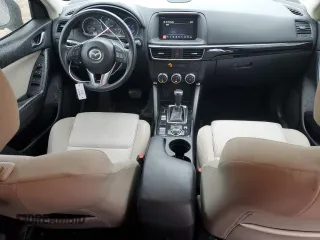 2016 Mazda CX-5 Sport with VIN JM3KE2BY5G0849261, listed as a Copart auction lot 45676495 with 118,305 mi miles and Salvage Title. Bid and sale history available at carsss.com. Image 8.