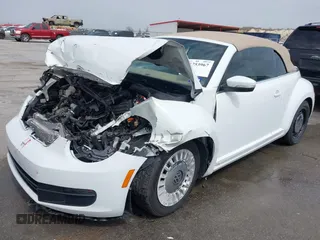 2015 Volkswagen Beetle 1.8T w/Tech with VIN 3VW517AT4FM812294, listed as a IAAI auction lot 41753967 with 59,857 mi miles and . Bid and sale history available at DreamBid. Image 2.