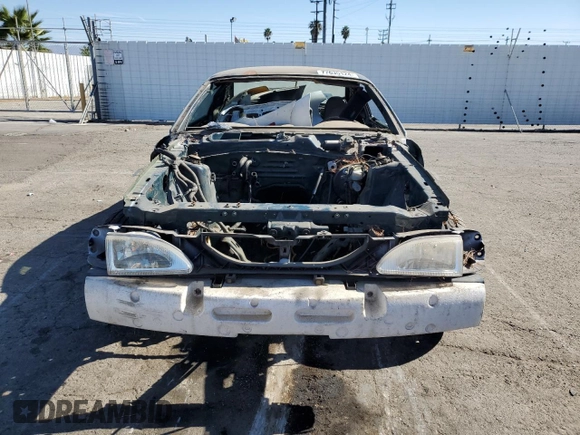 1995 Ford Mustang GT with VIN 1FALP42T7SF174211, listed as a Copart auction lot 77635124 with 158,940 mi miles and Salvage title. Bid and sale history available at DreamBid. Image 5.