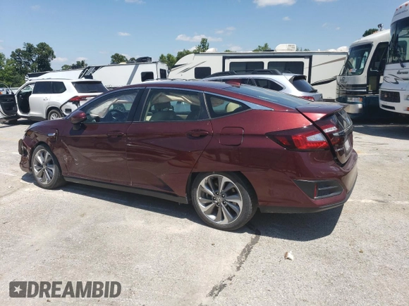 2018 Honda Clarity Touring with VIN JHMZC5F34JC006234, listed as a Copart auction lot 65652714 with 63,704 mi miles and Salvage Title. Bid and sale history available at DreamBid. Image 2.