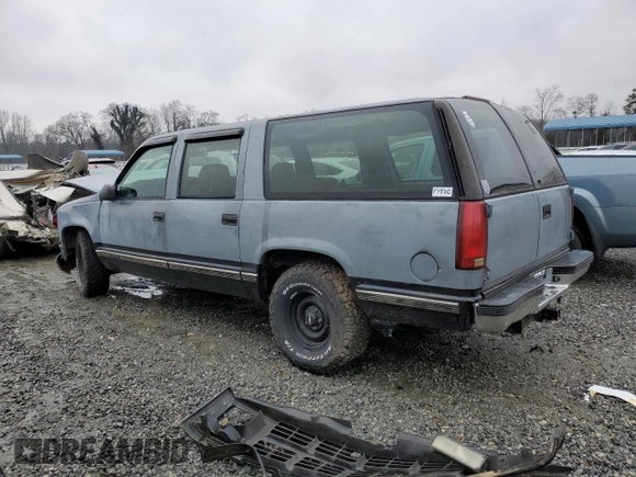 1999 Chevrolet Suburban with VIN 1GNEC16R3XJ492964, listed as a Copart auction lot 42053405 with 253,405 mi miles and Salvage Title. Bid and sale history available at carsss.com. Image 2.