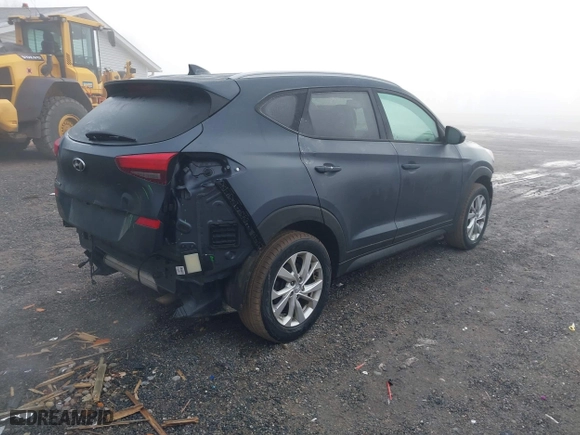 2019 Hyundai Tucson Value with VIN KM8J33A44KU995257, listed as a IAAI auction lot 41672206 with 63,090 mi miles. Bid and sale history available at carsss.com. Image 4.