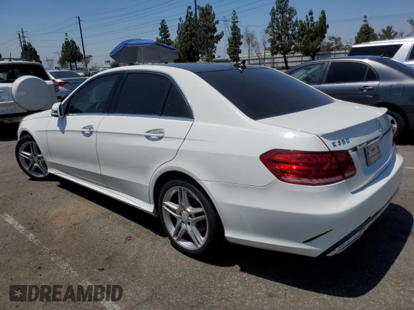 2014 Mercedes-Benz E 350 Sport with VIN WDDHF5KB8EA818290, listed as a Copart auction lot 62786005 with 128,327 mi miles and Salvage title. Bid and sale history available at DreamBid. Image 2.