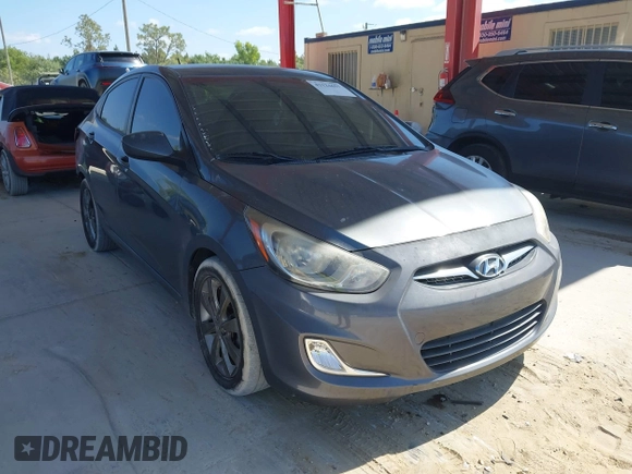 2012 Hyundai Accent GLS with VIN KMHCU4AE5CU246327, listed as a IAAI auction lot 42124657 with 139,287 mi miles. Bid and sale history available at carsss.com. Image 1.