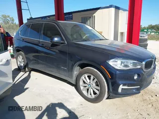 2015 BMW X5 xDrive35i z VIN 5UXKR0C50F0P04325, wystawiony jako IAAI lot #40943946 z przebiegiem 145 602 mil mil oraz . Historia ofert i sprzedaży dostępna na DreamBid. Obrazek 1.