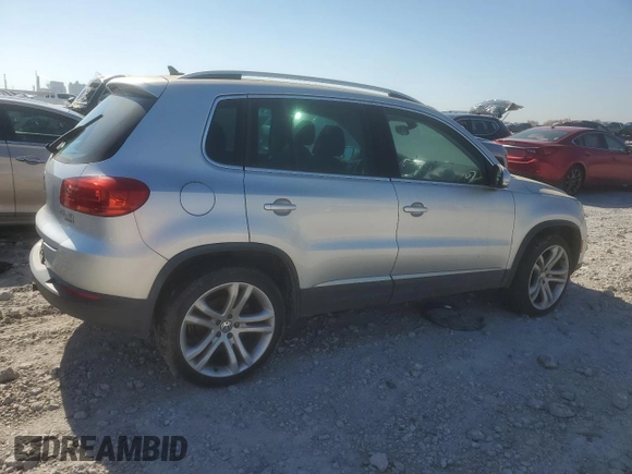 2012 Volkswagen Tiguan S with VIN WVGBV7AX5CW601352, listed as a Copart auction lot 48768155 with 161,632 mi miles and Salvage Title. Bid and sale history available at DreamBid. Image 3.