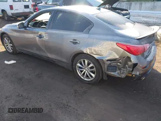 2015 Infiniti Q50 Premium z VIN JN1BV7AR2FM423666, wystawiony jako IAAI lot #41345228 z przebiegiem 67 027 mil mil oraz . Historia ofert i sprzedaży dostępna na DreamBid. Obrazek 3.