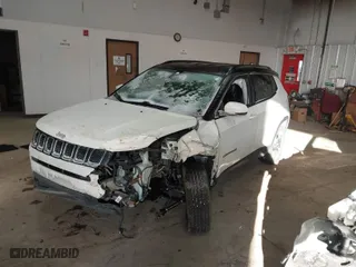 2020 Jeep Compass Limited with VIN 3C4NJDCB3LT120048, listed as a IAAI auction lot 41366651 with 83,260 mi miles. Bid and sale history available at carsss.com. Image 2.