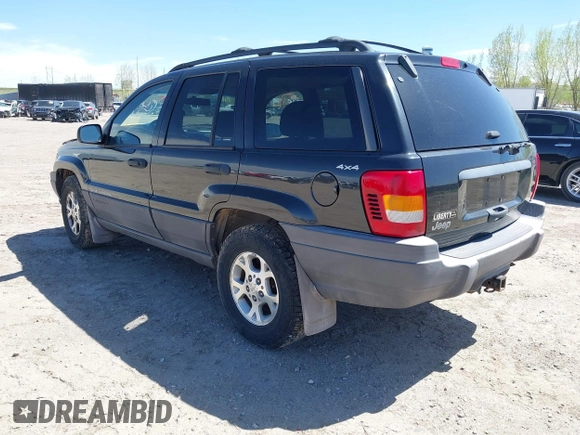 1999 Jeep Grand Cherokee Laredo with VIN 1J4GW58S8XC524502, listed as a IAAI auction lot 42193506 with 147,920 mi miles and . Bid and sale history available at DreamBid. Image 3.