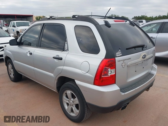 2009 Kia Sportage LX with VIN KNDJF724097567390, listed as a IAAI auction lot 42066762 with 159,946 mi miles. Bid and sale history available at carsss.com. Image 3.
