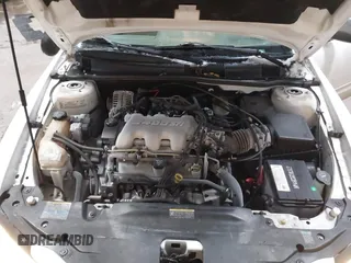 2005 Pontiac Grand Am SE with VIN 1G2NE52E75M198223, listed as a IAAI auction lot 41310937 with 100,889 mi miles. Bid and sale history available at carsss.com. Image 10.