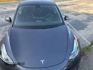 2023 Tesla Model 3 with VIN 5YJ3E1EA1PF607137, listed as a Copart auction lot 62613375 with 27,271 mi miles and Clean title. Bid and sale history available at DreamBid. Image 7.