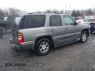 2005 GMC Yukon Denali z VIN 1GKEK63U25J228296, wystawiony jako IAAI lot #40980307 z przebiegiem 192 353 mil mil oraz . Historia ofert i sprzedaży dostępna na DreamBid. Obrazek 4.