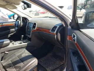 2011 Jeep Grand Cherokee Limited with VIN 1J4RR5GT9BC510322, listed as a IAAI auction lot 42003802 with 211,684 mi miles. Bid and sale history available at carsss.com. Image 5.