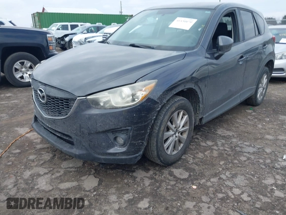 2015 Mazda CX-5 Touring with VIN JM3KE2CY2F0461935, listed as a IAAI auction lot 41430070 with 220,857 mi miles and . Bid and sale history available at DreamBid. Image 2.