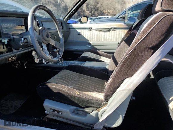 1987 Buick Regal with VIN 1G4GJ1171HP440059, listed as a Copart auction lot 51641495 with 21,443 mi miles and Salvage Title. Bid and sale history available at DreamBid. Image 7.