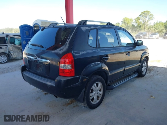 2007 Hyundai Tucson SE with VIN KM8JN12D07U475917, listed as a IAAI auction lot 41872876 with 172,006 mi miles. Bid and sale history available at carsss.com. Image 4.