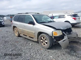 2002 GMC Envoy SLT with VIN 1GKDS13SX22432542, listed as a IAAI auction lot 41620090 with 182,884 mi miles. Bid and sale history available at carsss.com. Image 1.